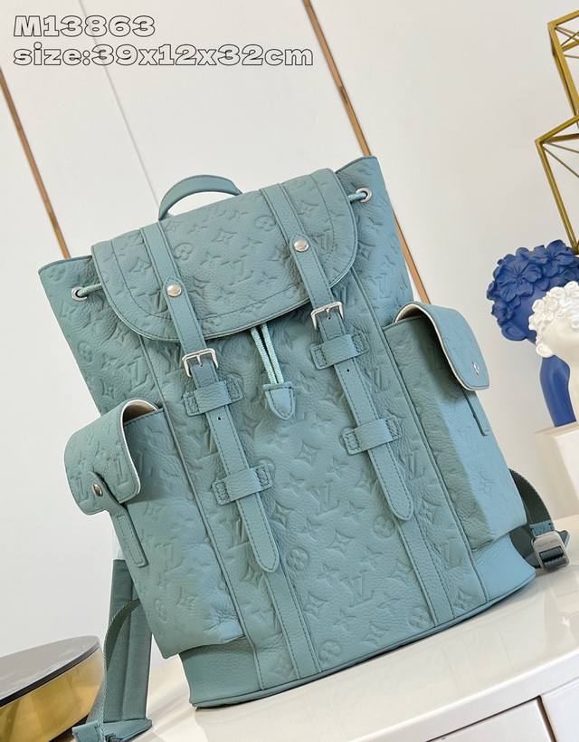 M13863 This Christopher backpack features a condensed classic design, retaining
