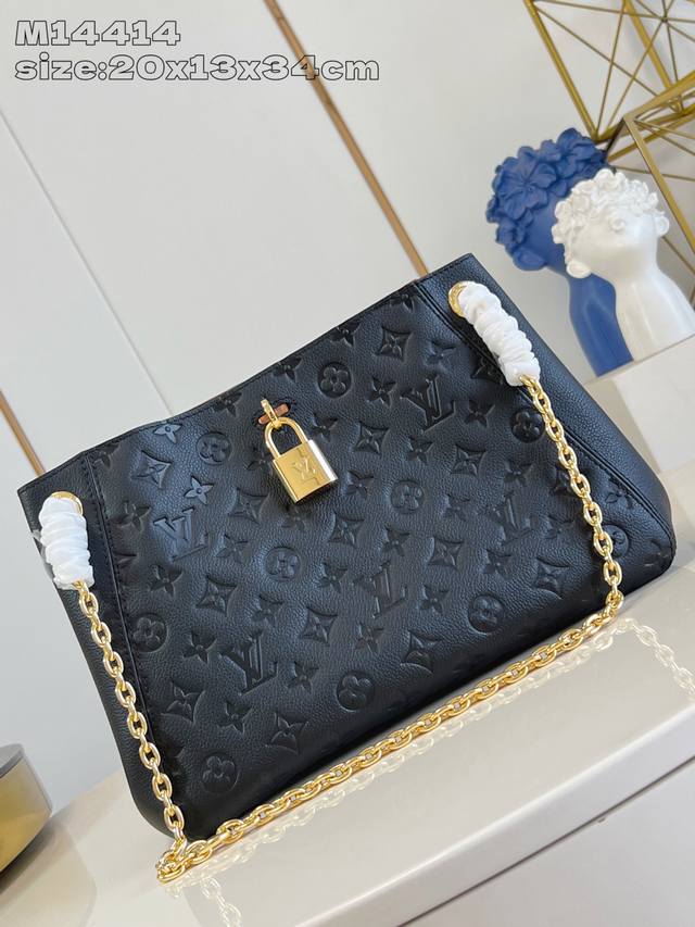 M14414 Black Edition Anytime Small Handbag: A nod to the Promenade handbag born