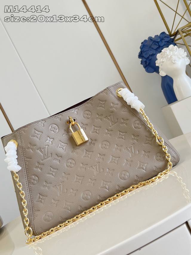 M14414 Grey Anytime Small Handbag: This bag draws inspiration from the Promenade