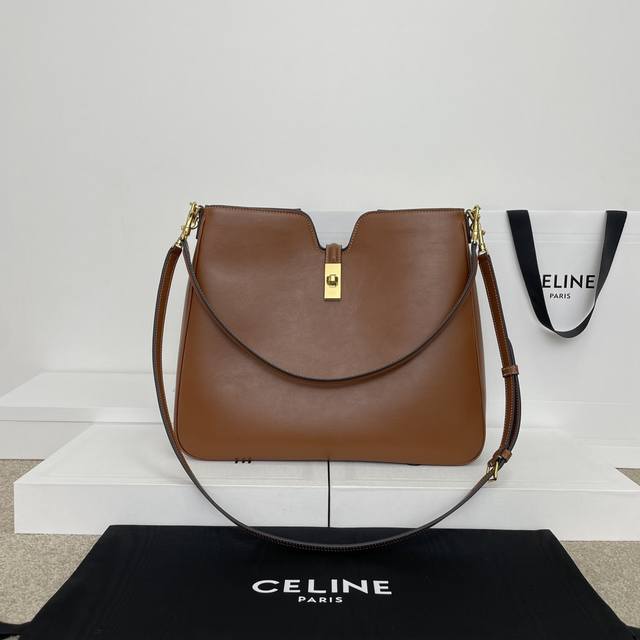 Authentic Camille 16 Soft Medium Smooth Cowhide Leather Handbag. This model can