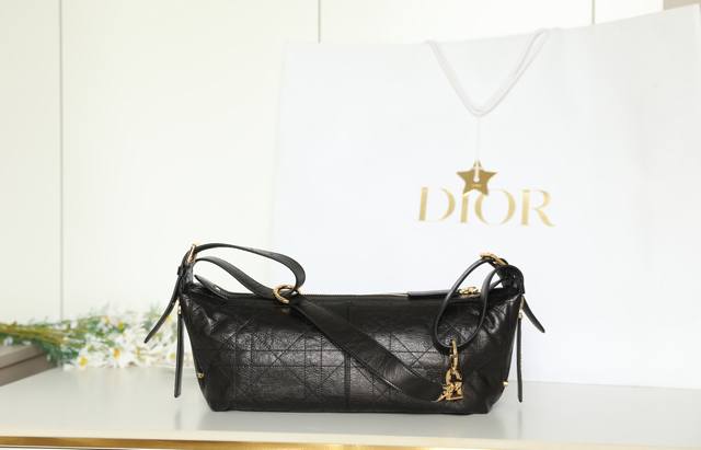 DJ Handbag Soft to the touch, this bag offers a modern interpretation of the dum