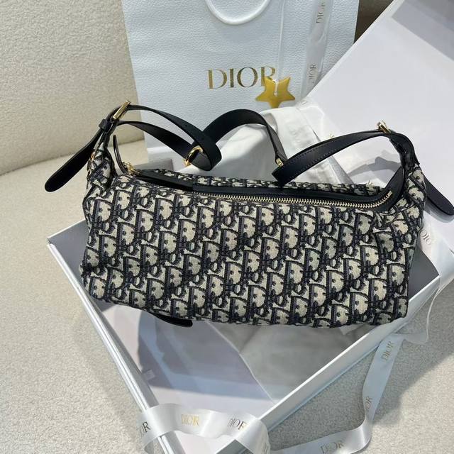 Medium-sized monogram canvas bag, duty-free version. Uniquely shaped like a gol