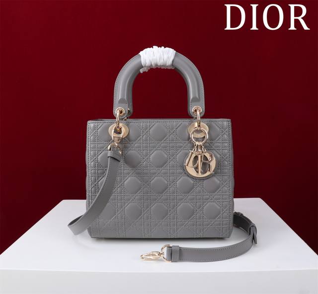Lady Dior Handbag with Double Quilted Pattern This Lady Dior handbag embodies Di