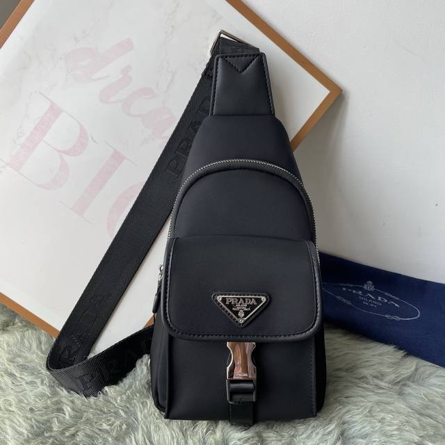 Prada black chest bag, made of lightweight and durable nylon, with the classic