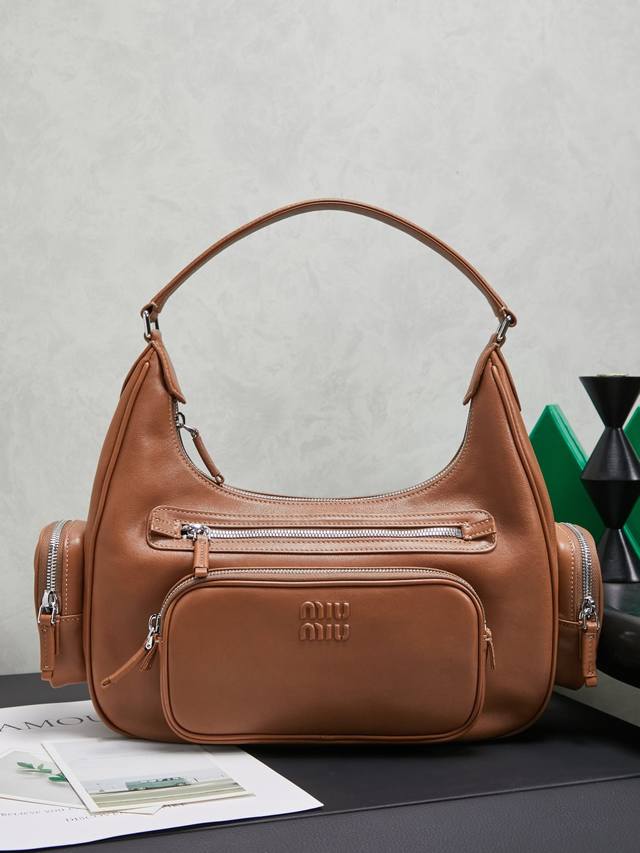New Motorcycle Bag This Miu pocket bag is so spacious! It's a sold-out must-have
