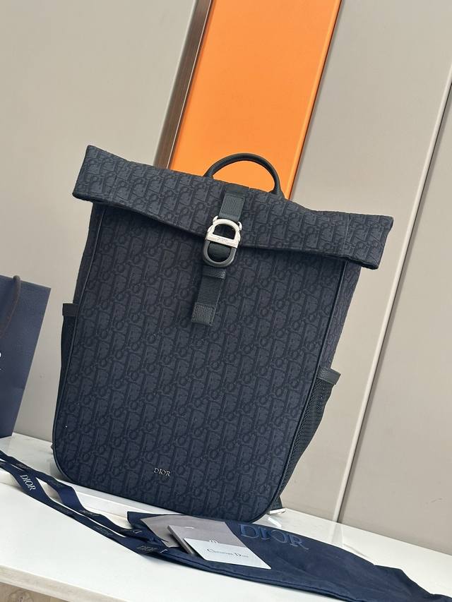 Authentic, High-Quality This Dior 8 Rolled-Top Backpack is a new addition to th