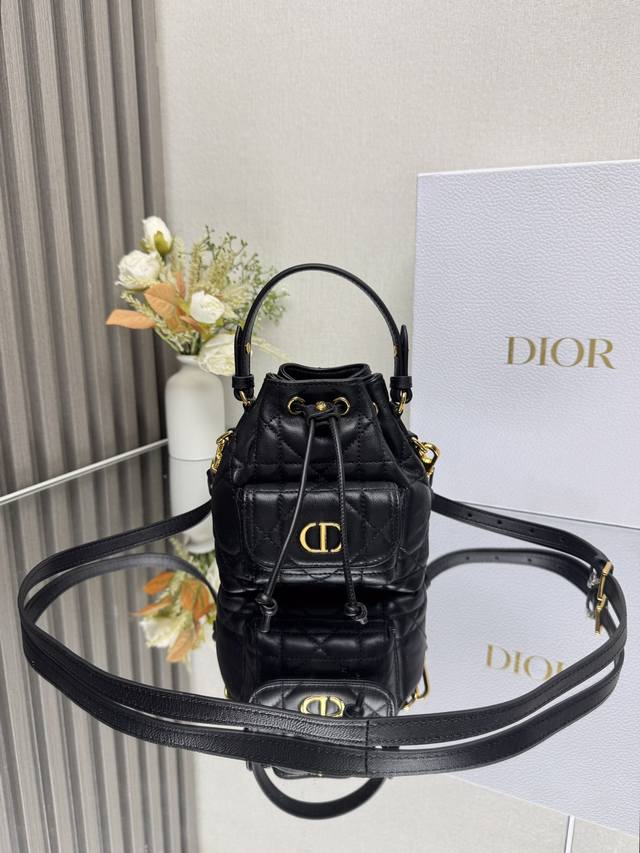 Authentic, High-Quality This mini Dior Caro bucket bag is a new addition to the