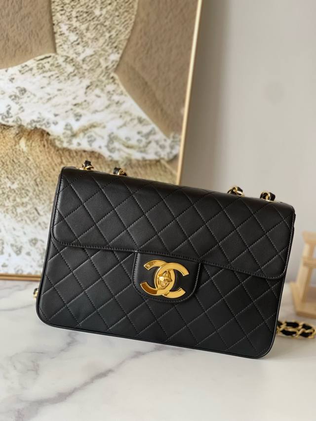Victoria Beckham's Chanel Black Lambskin Bag Limited Edition Large Gold Buckle