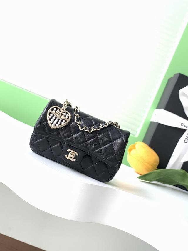 25A Mini Heart Pearl CF Charm Small Leather Goods. The charm of Chanel's M