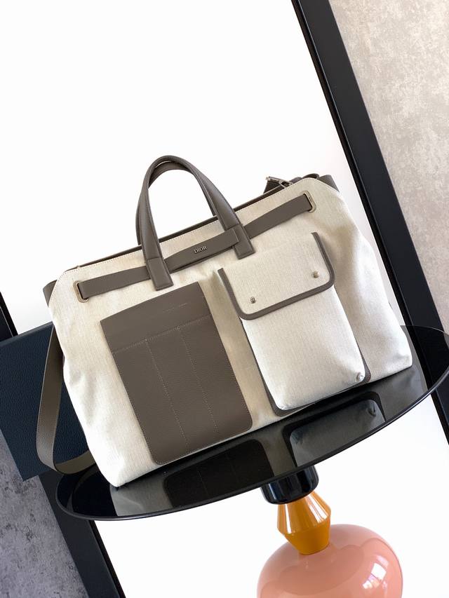 This Dior Normandie handbag seamlessly blends practical design with Dior's haut