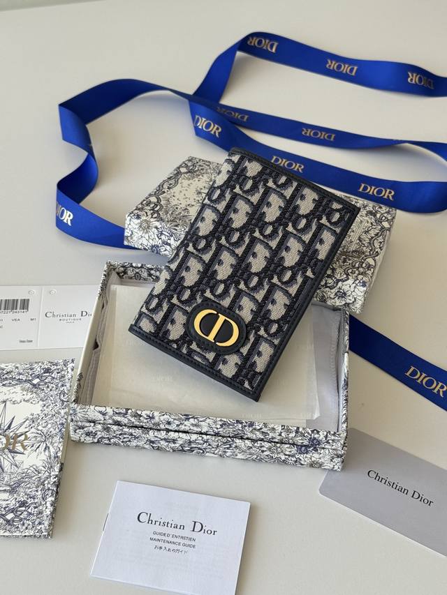 Passport Holder This passport holder is both practical and elegant. Crafted from