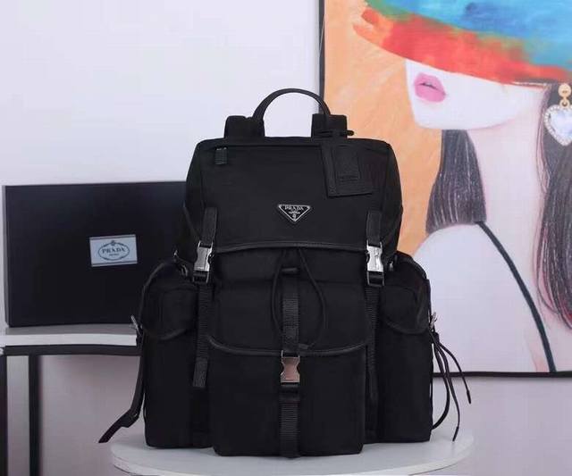 New Backpack 2Vz074 Made of fabric with Saffiano leather trim, this backpack fea