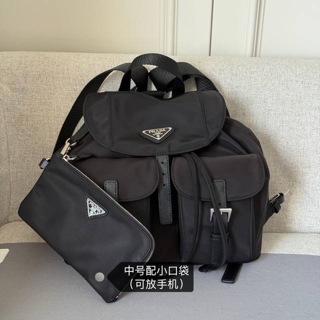 New Backpack 1Bz811 This nylon backpack features exquisite Saffiano leather trim