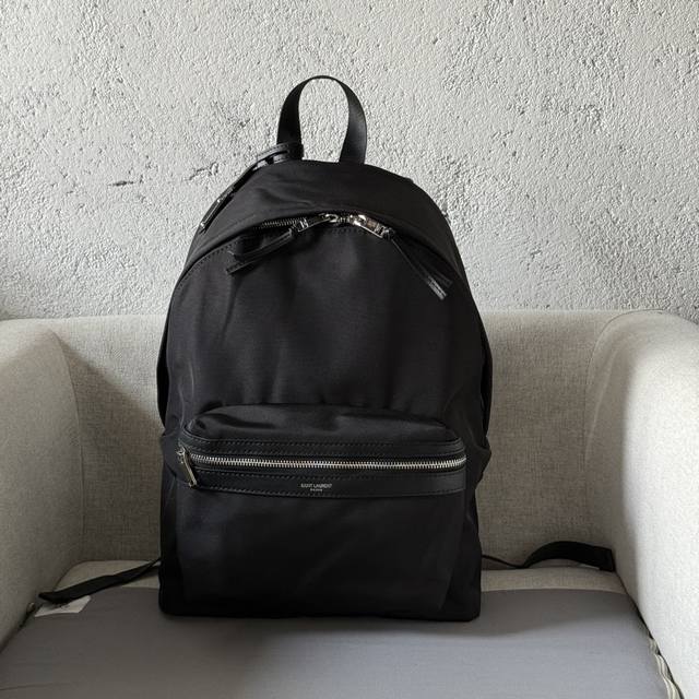 Backpack with a genuine leather-trimmed Saint Laurent logo-printed front pocket