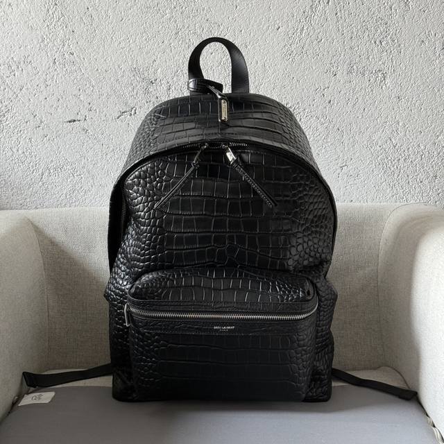 Genuine leather backpack with embossed Saint Laurent logo and external zip pock