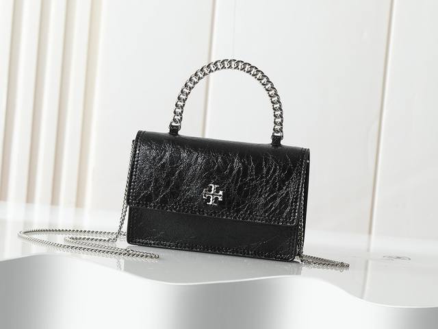 Tory Burch's new Mini Kira in oil-waxed leather. This new model from the Kira s
