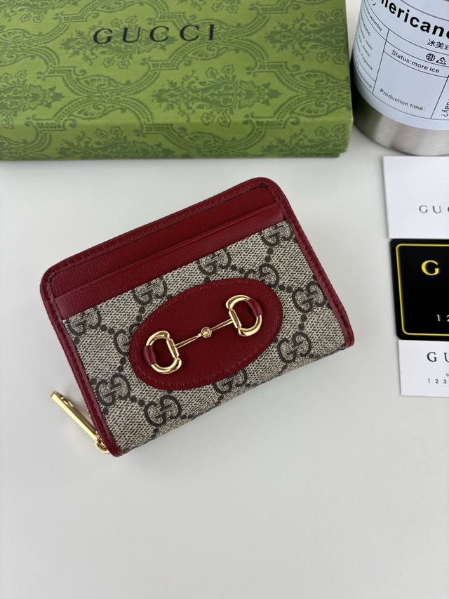 Gucci introduces its new 1955 Horsebit cardholder, crafted from Gg Supreme canva