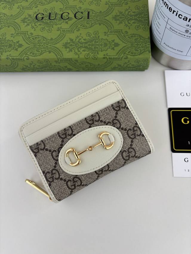 Gucci introduces its new 1955 Horsebit cardholder, crafted from Gg Supreme canva