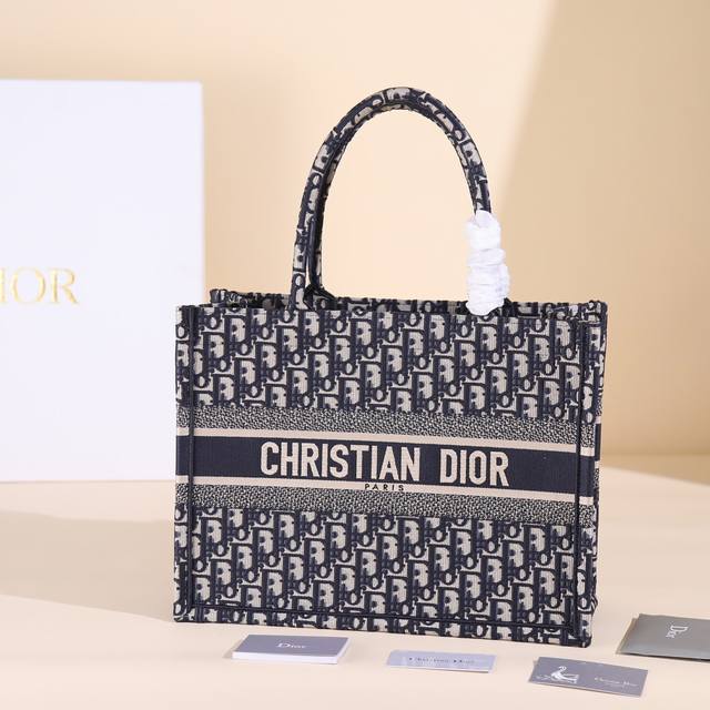 This Book Tote handbag, designed by Dior's Women's Creative Director Maria Graz
