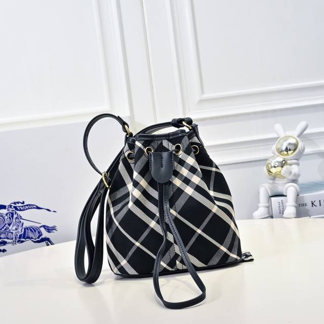 Beauty's latest mini bucket bag, crafted from cotton twill fabric. Handmade in t