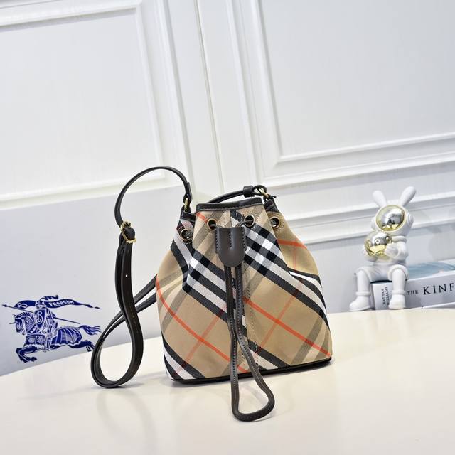 Beauty's latest mini bucket bag, crafted from cotton twill fabric. Handmade in t