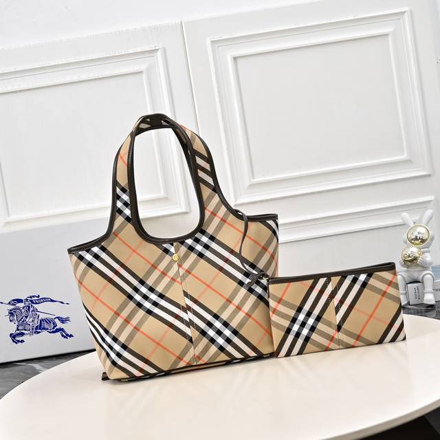 Burberry's latest soft and structured tote bag, crafted from cotton twill fabri