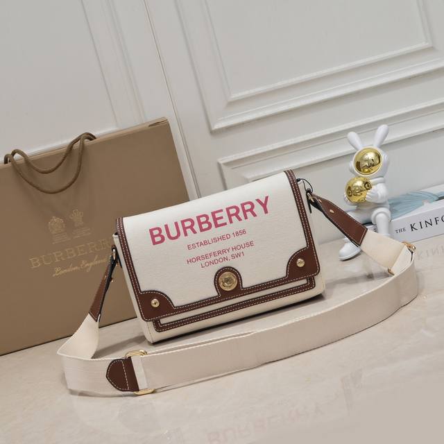 A sophisticated crossbody bag from Burberry, crafted from select top-stitched l