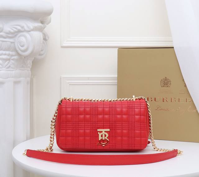 B's brand. The Tb Lola bag is crafted from Italian tanned lambskin and features