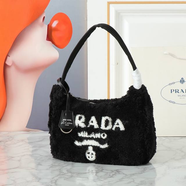 Restock Plush Hobo This Re-Edition 2000 soft terry cloth mini handbag exudes sum