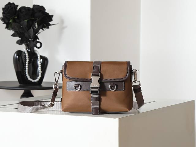 Model 2Zt071 Cowhide and Nylon Fabric Phone Bag. This sophisticated and modern