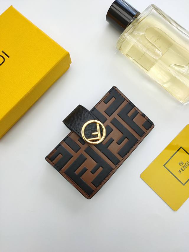 Fendi F Is Fendi flat card holder with a middle compartment and five card slots