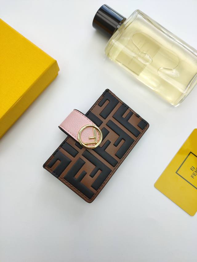 Fendi F Is Fendi flat card holder with a middle compartment and five card slots