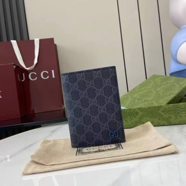 Top-of-the-line new Gg passport holder with Gg details. The new series presents