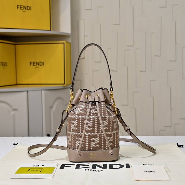 Original Mon Tresor Bucket Bag in Fabric. Featuring the classic monogram logo an