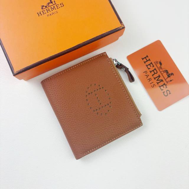 Hermes New Arrivals Silk'In Togo Women's Photo Bag in Barenia Calfskin. Features