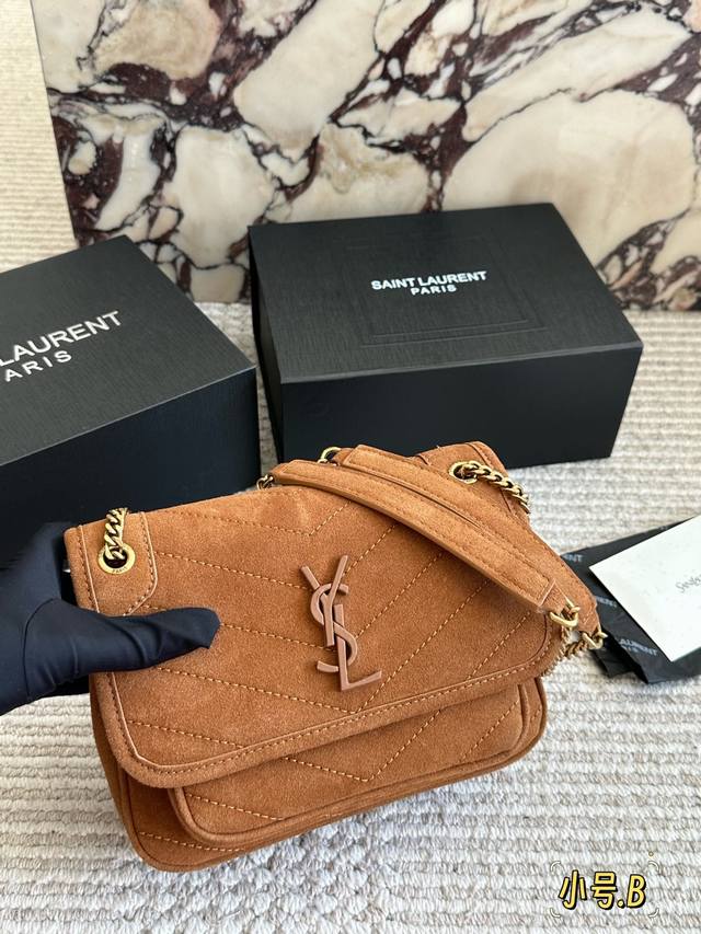 Suede Leather The suede Niki bag is simply too cool! The shape is beautiful and