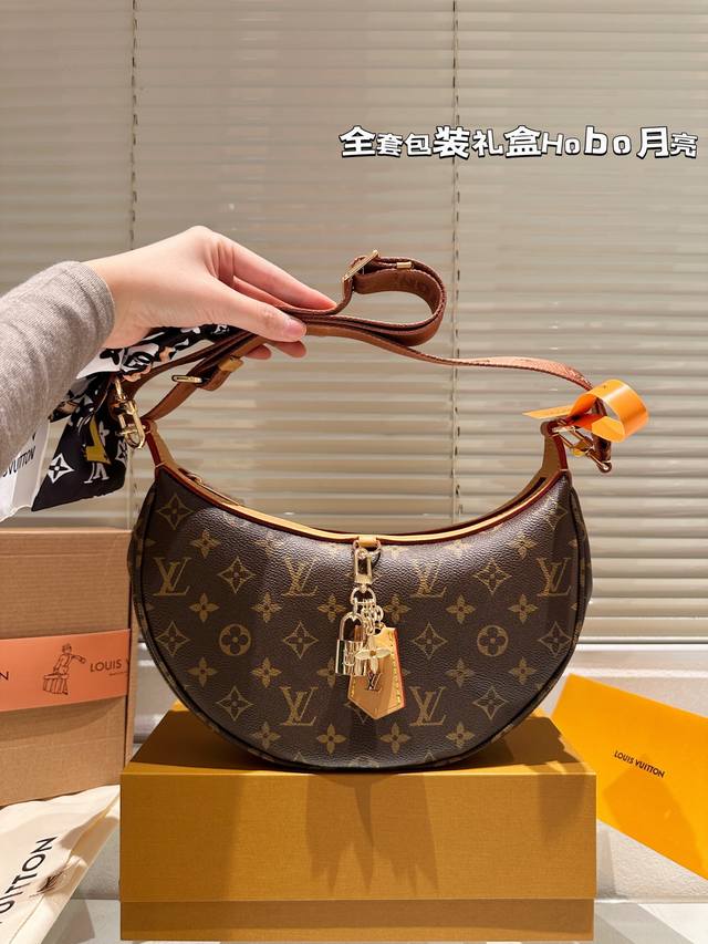Leather version with scarf LV Looping handbag The LV Looping handbag combines e