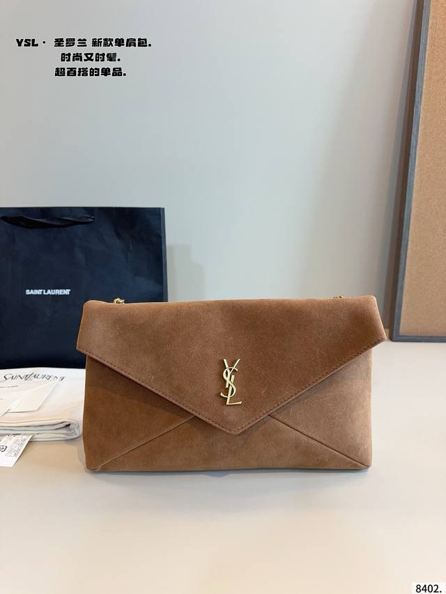 Saint Laurent YSL WOC Suede Envelope Bag. A classic bag recommendation! Especia