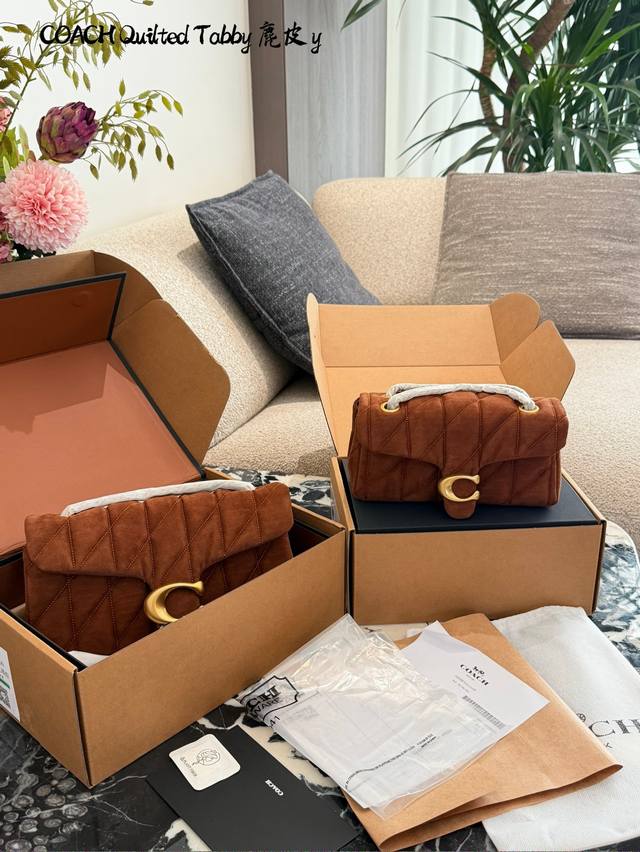 Coach Suede Tabby Coach Tabby quilted chain shoulder bag exudes a chic and styli