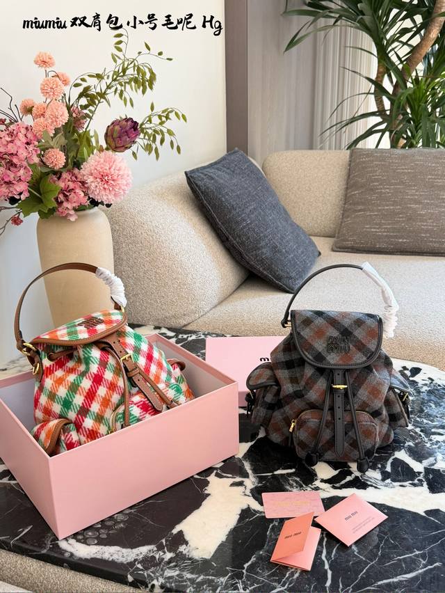Miu Miu Check Wool Backpack This Miu Miu check wool backpack is a limited editio