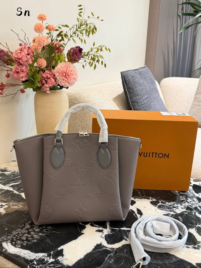 Lv Tote Bag The interplay of smooth and perforated calfskin makes the Haumea tot