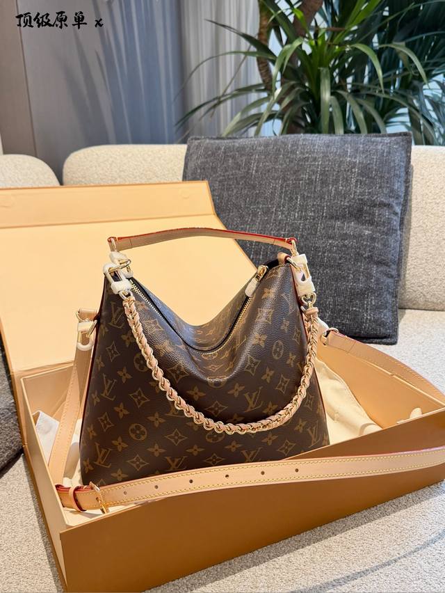 LV Multipass Handbag The LV Multipass handbag is inspired by the Express bag, fe