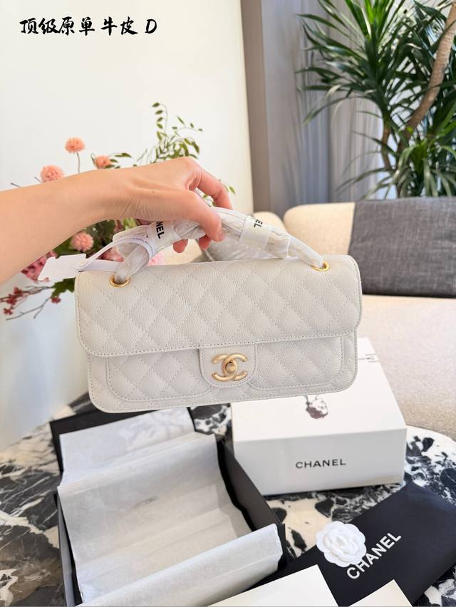 Caviar Leather Chanel 25B Pocket Bag The Chanel 25B pocket bag, nicknamed the "b