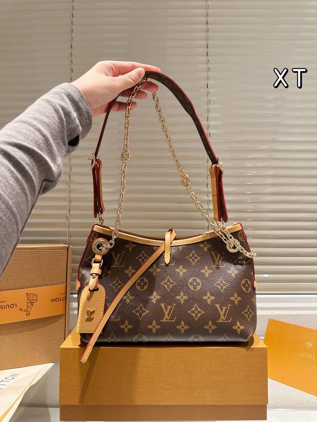 Cowhide Version LV Carryall BB Handbag The LV Carryall BB handbag is made of cl
