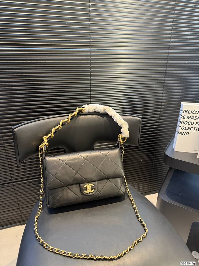 Chanel Black and Gold CF Two-Tone Chain Bag The chunky chain instantly injects a