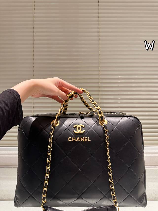 Chanel Black and Gold Quilted Travel Bag This Chanel black and gold quilted came