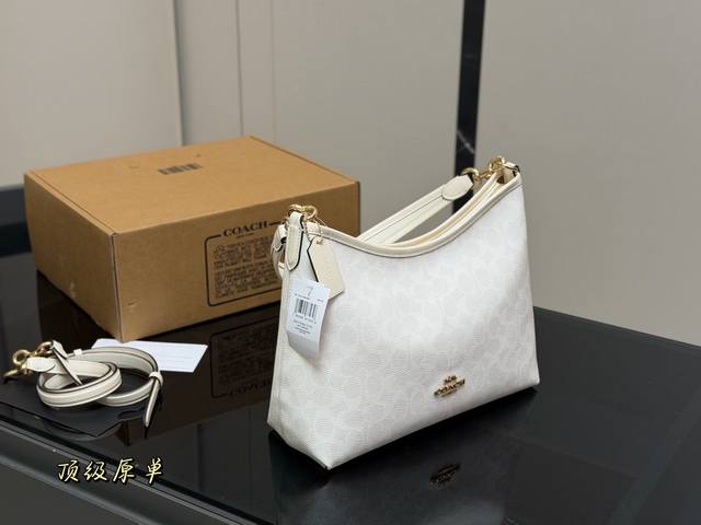 Replica with airplane box Size: 31*23Cm The new Coach Laurel hobo bag is absolu