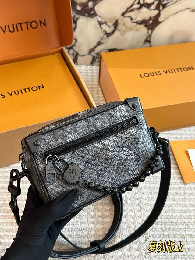 New Mini Soft Trunk M14729 This vintage-style mini soft trunk is made of Monogr