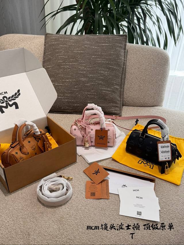 Mcm Mini Boston Bag The Mcm mini Boston bag features Visetos monogram coated can