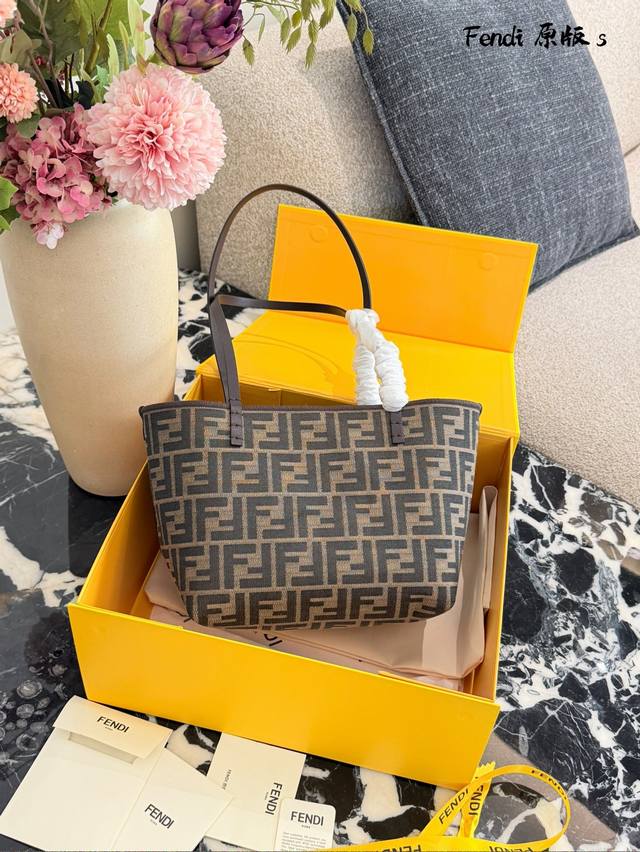 Fendi Zucca Monogram Tote Bag The Fendi Zucca tote bag features classic double-F